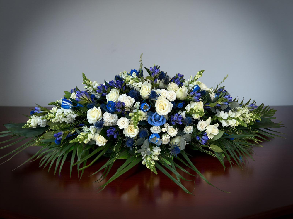 Funeral blue sky spray